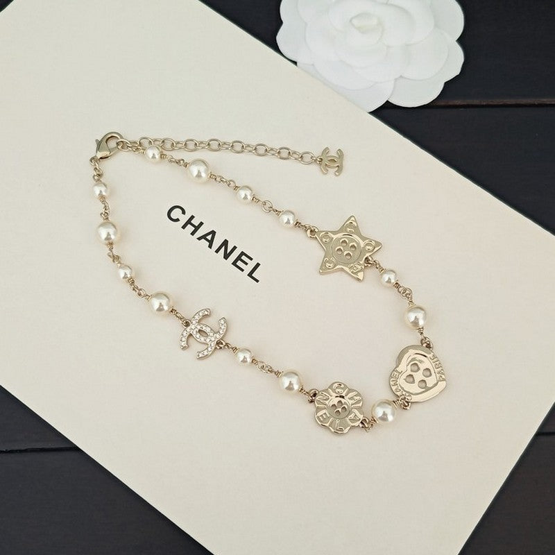 18K Chanel Pearl Star Necklace