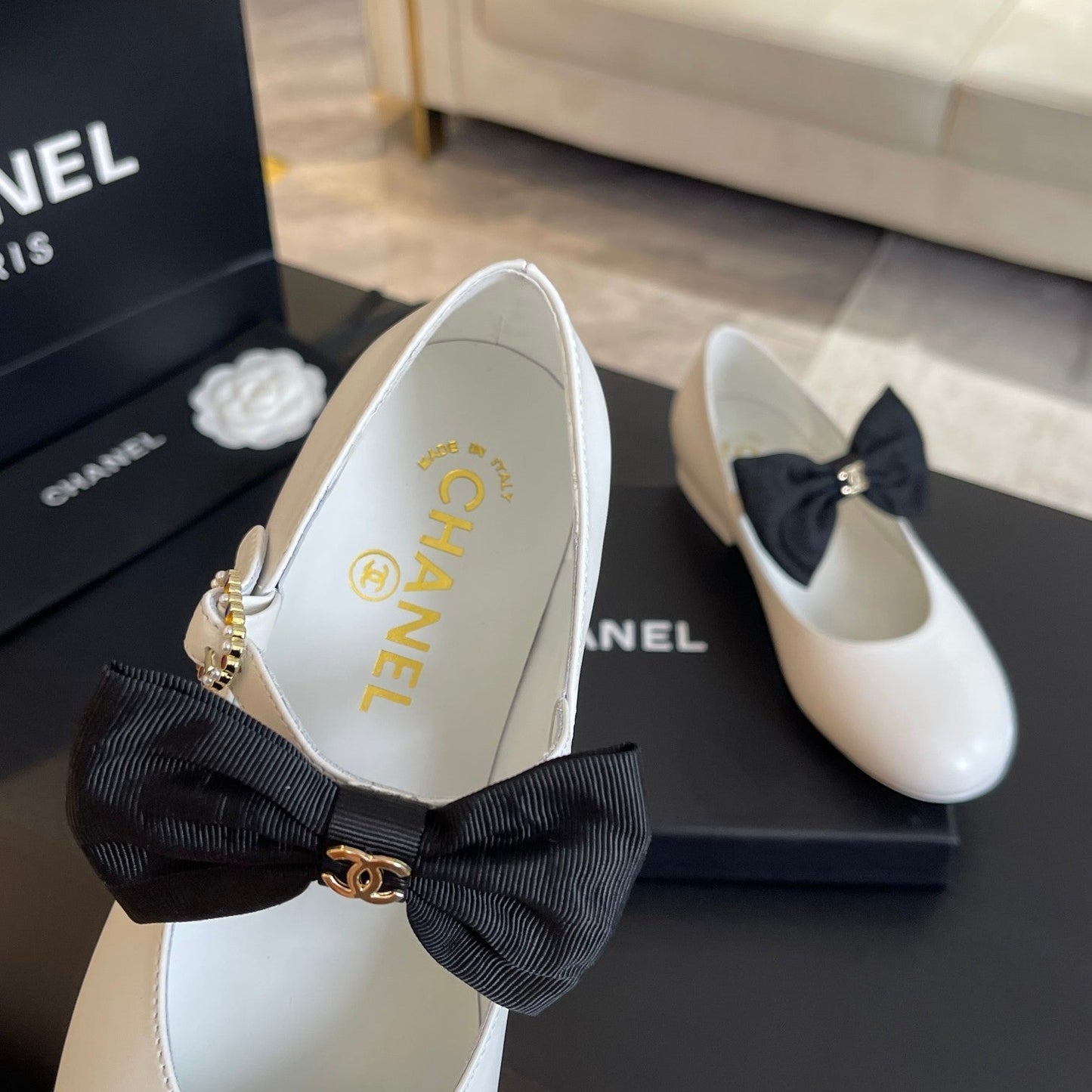 CHANEL BALLET FLAT WHITE LAMBSKIN WITH BLACK BOW