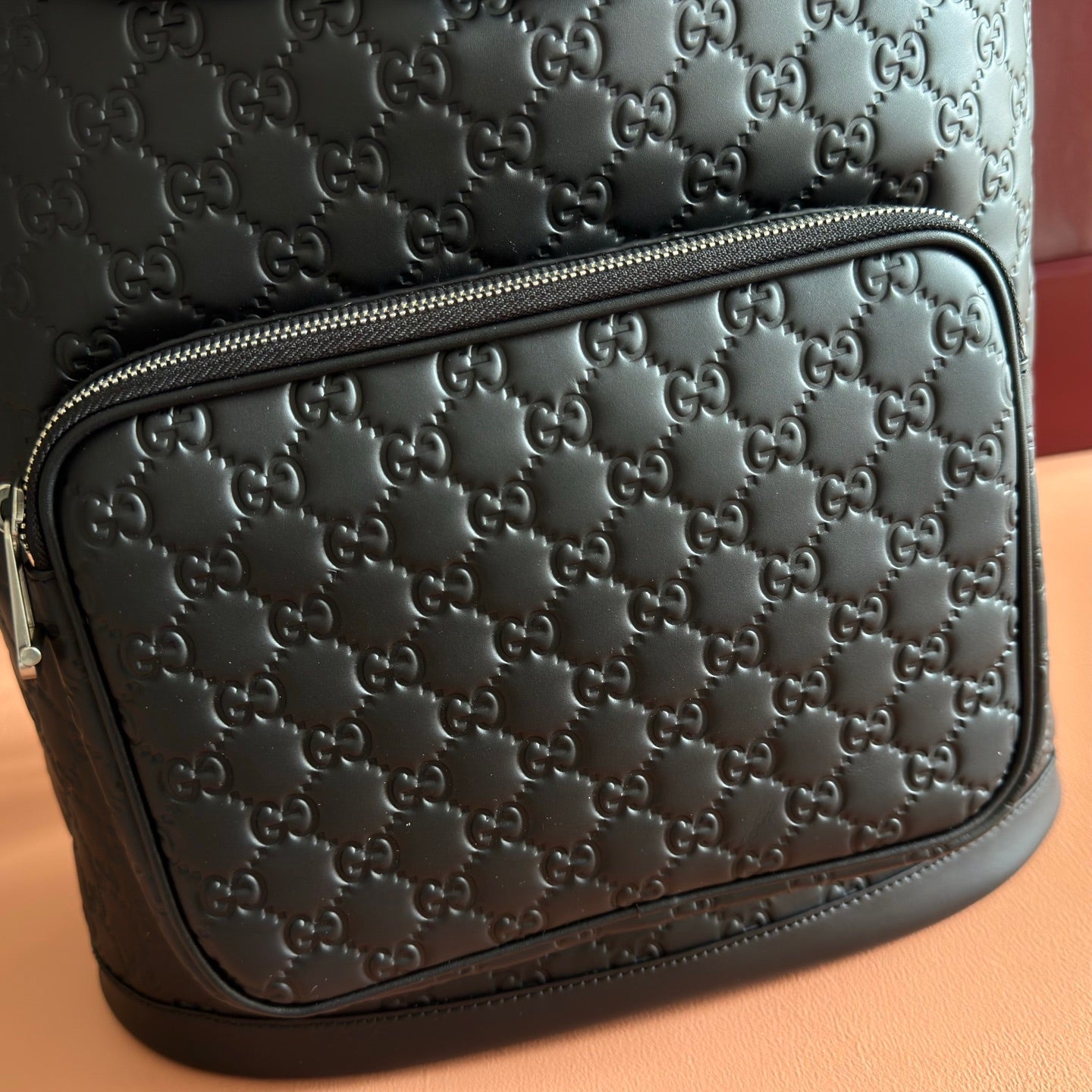 GUCCI 26S EMBLEM BACKPACK 44 IN BLACK EMBOSSED CALFSKIN