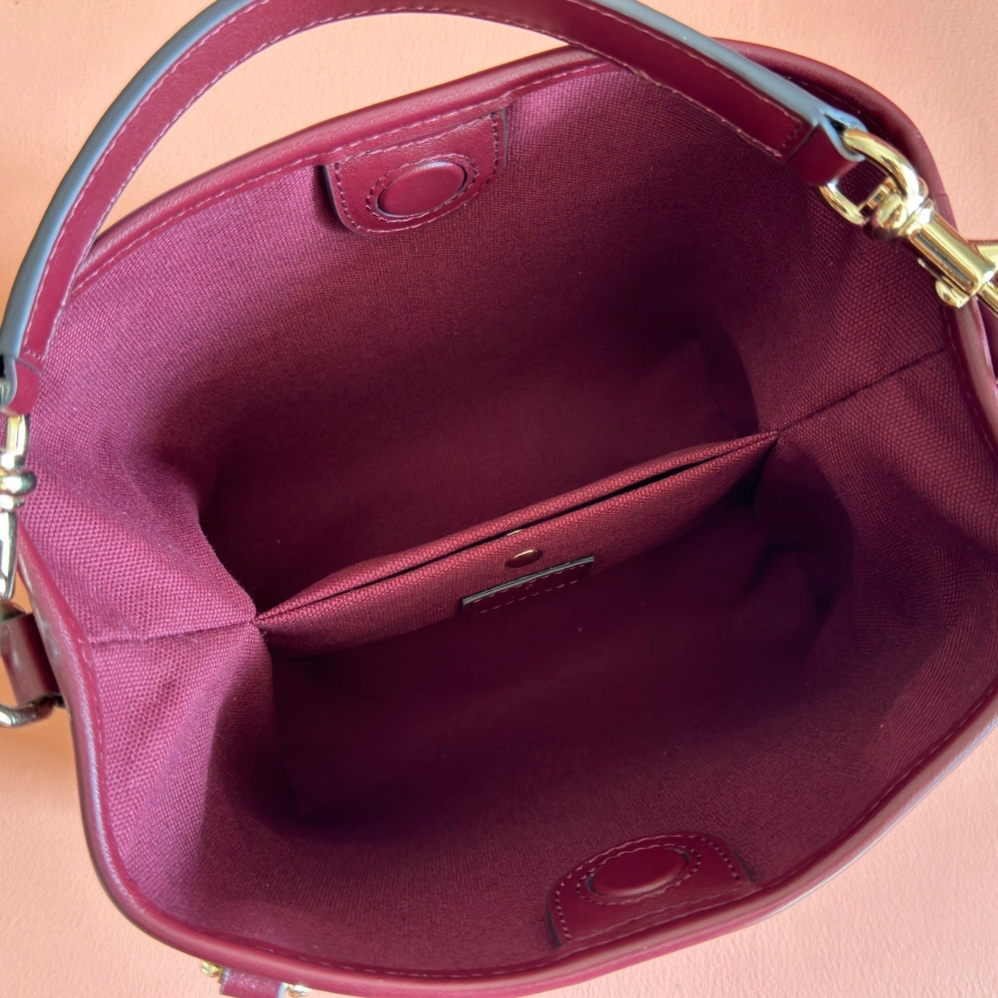 GUCCI 26S EMBLEM BUCKET BAG 19 IN DARK RED COATED FABRIC