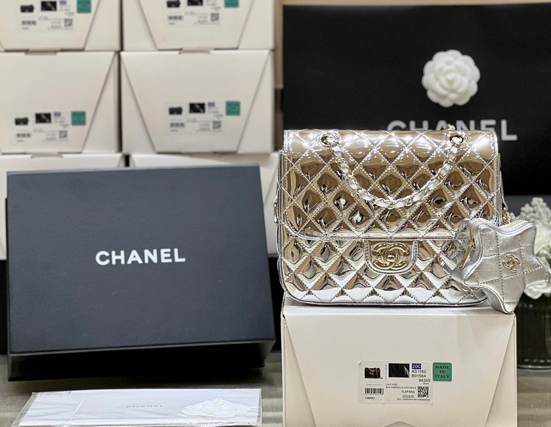 CHANEL 25S STAR SILVER 23 IN METALLIC SILVER CALFSKIN