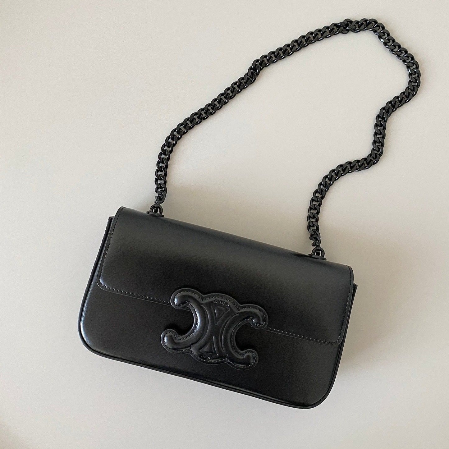 CELINE 20 CHAIN EMBOSSED ARMPIT BAG FULL BLACK CALFSKIN