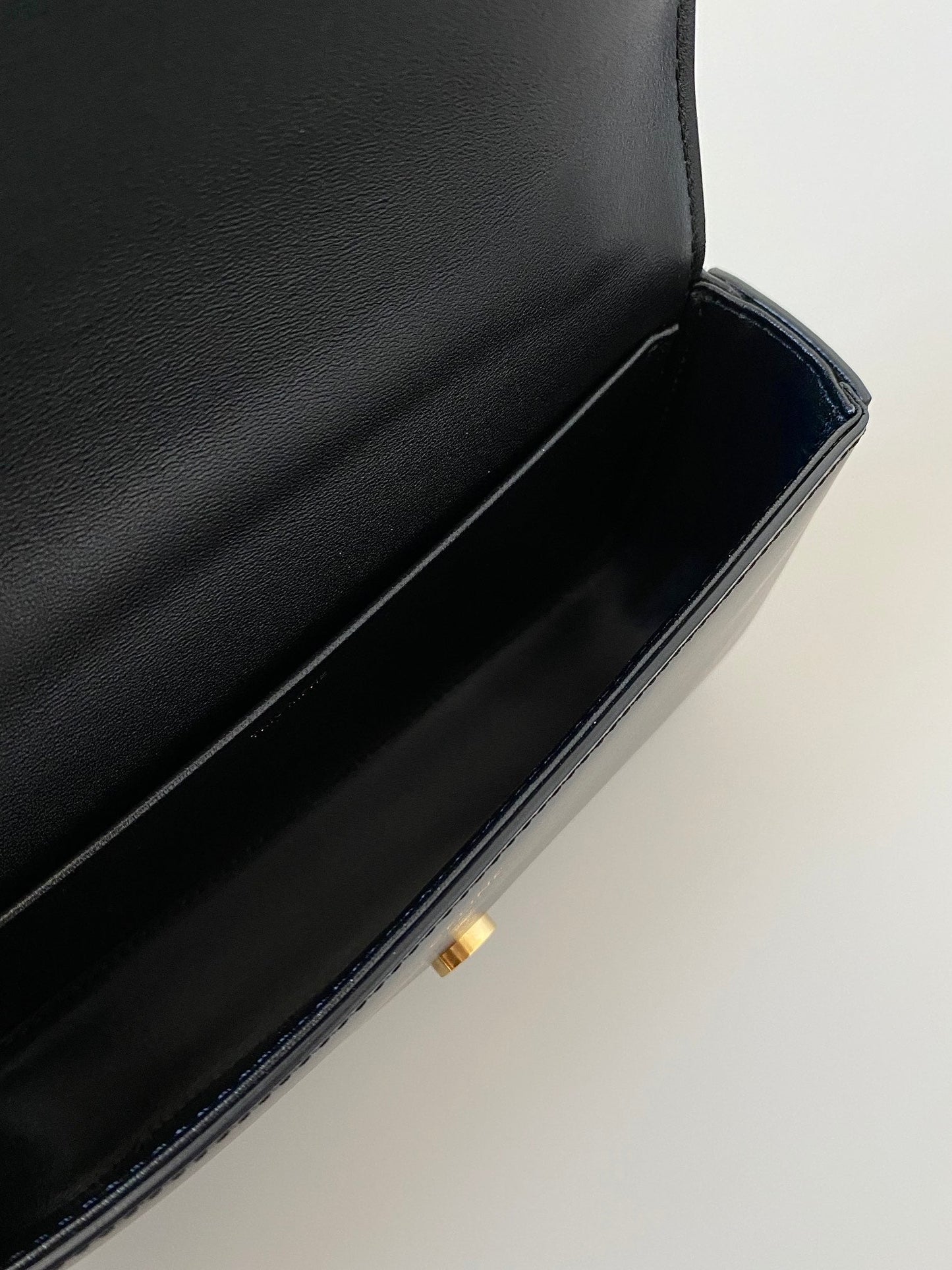 CELINE 20 CHAIN EMBOSSED ARMPIT BAG BLACK CALFSKIN