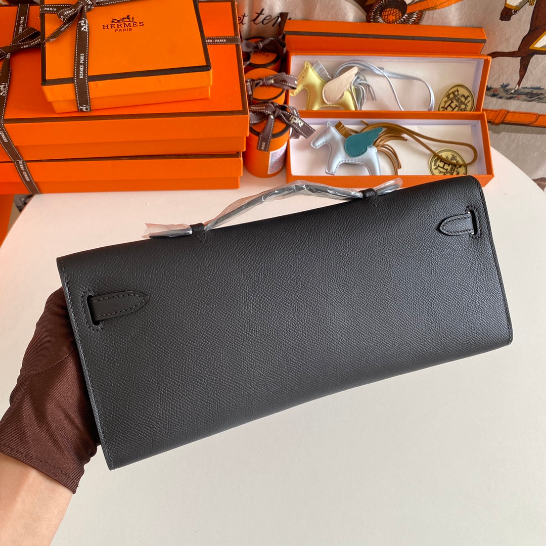 HERMES KELLY CUT 31 IN BLACK CALFSKIN WITH SILVER HARDWARE