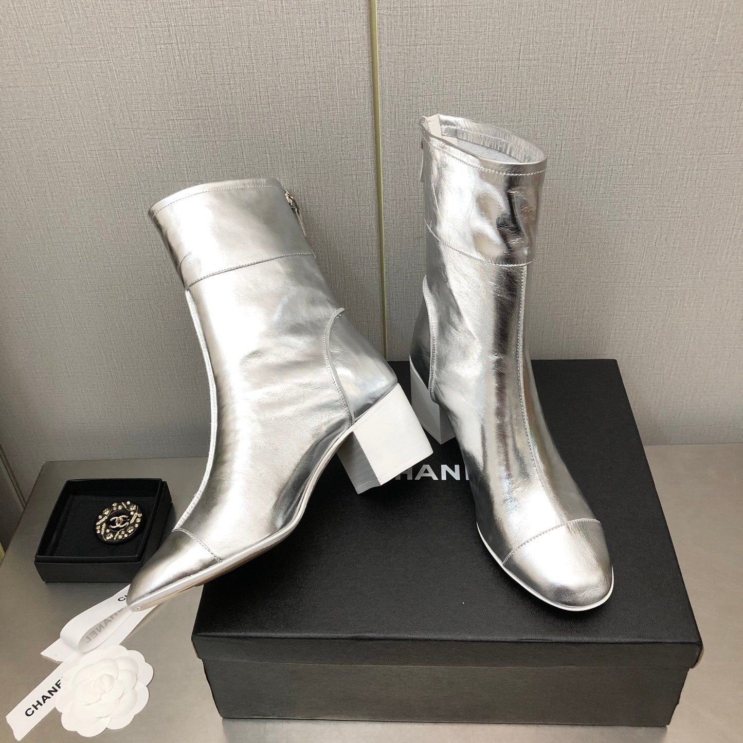 CHANEL BLOCK HEEL ANKLE BOOTS IN SILVER CALFSKIN