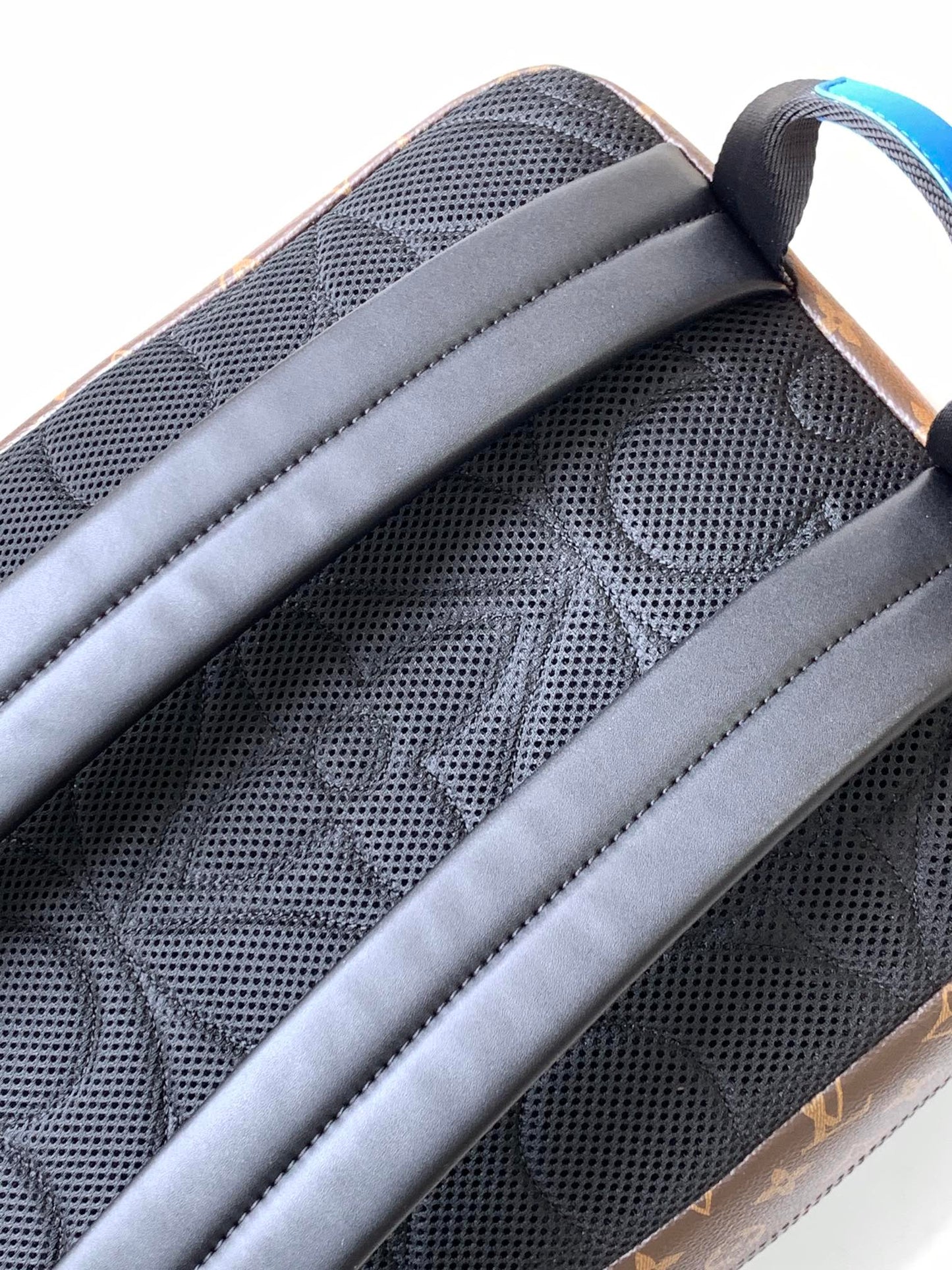 LOUIS VUITTON DEAN BACKPACK 42 IN BLUE AND BROWN MONOGRAM CANVAS