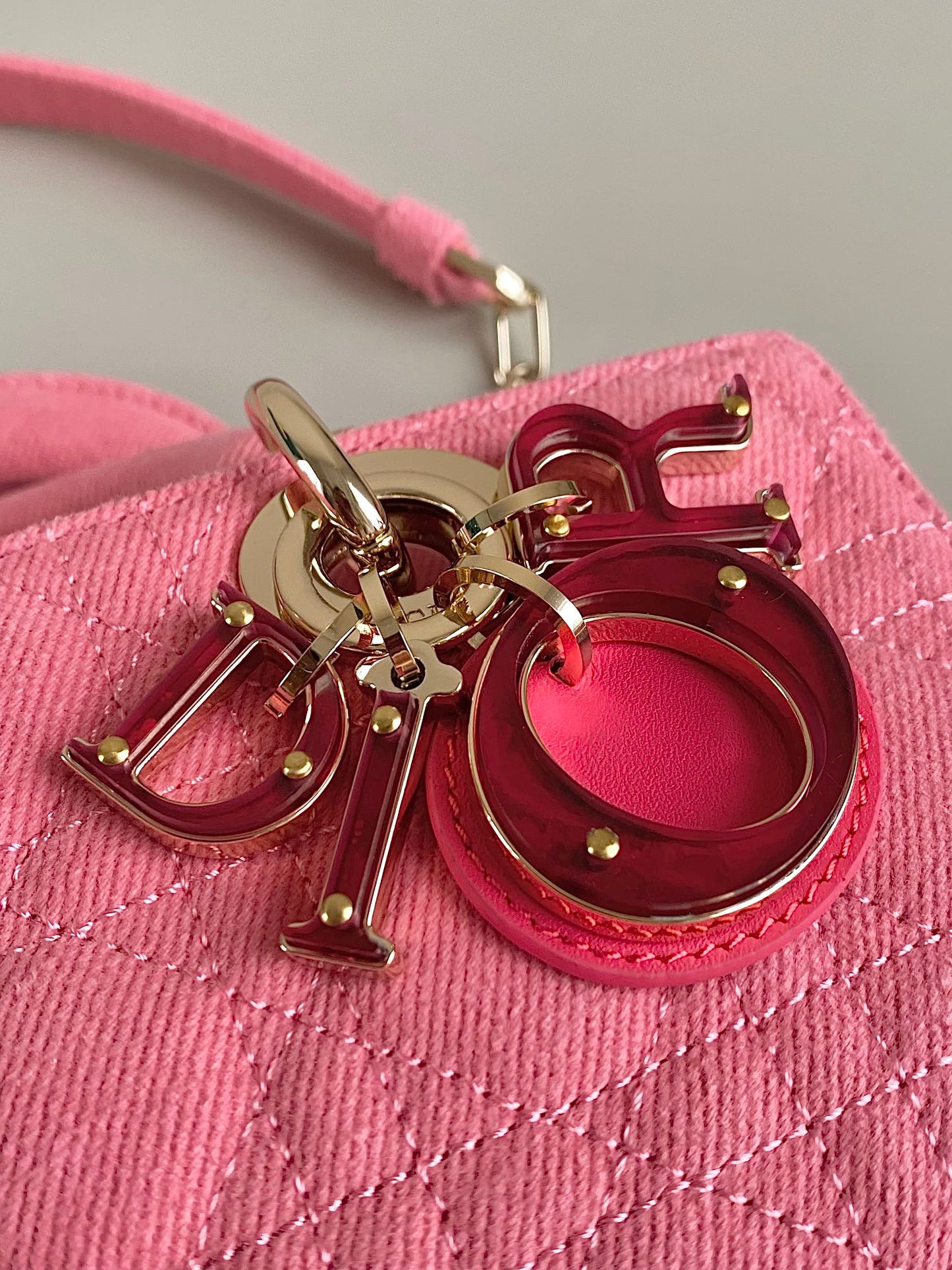 DIOR D-JOY BAG 22 IN HOT PINK MACROCANNAGE DENIM