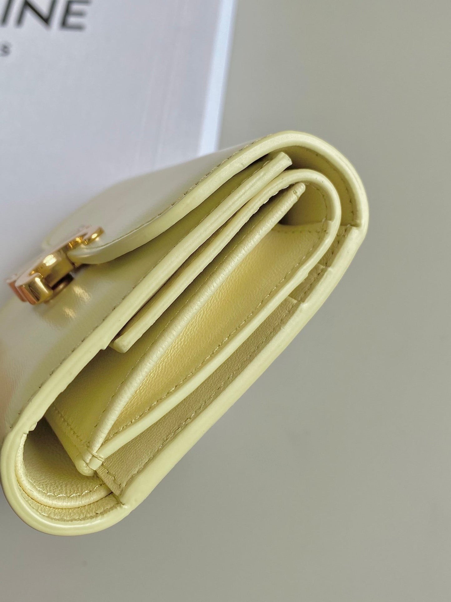 CELINE TRIPHOME 10 TRIFOLD WALLET CALFSKIN YELLOW PASTEL