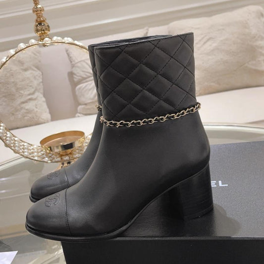 CHANEL MID-HEEL ANKLE BOOTS IN BLACK CALFSKIN