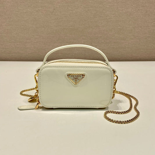 PRADA MINI HAND BAG 11 WITH GOLD STRAP IN WHITE PATENT CALFSKIN