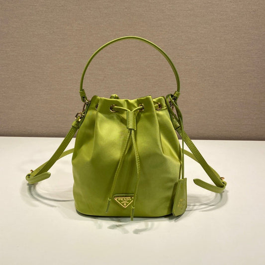 PRADA BUCKET BAG 19 IN APPLE GREEN RE-NYLON AND SAFFIANO LEATHER HANDLE