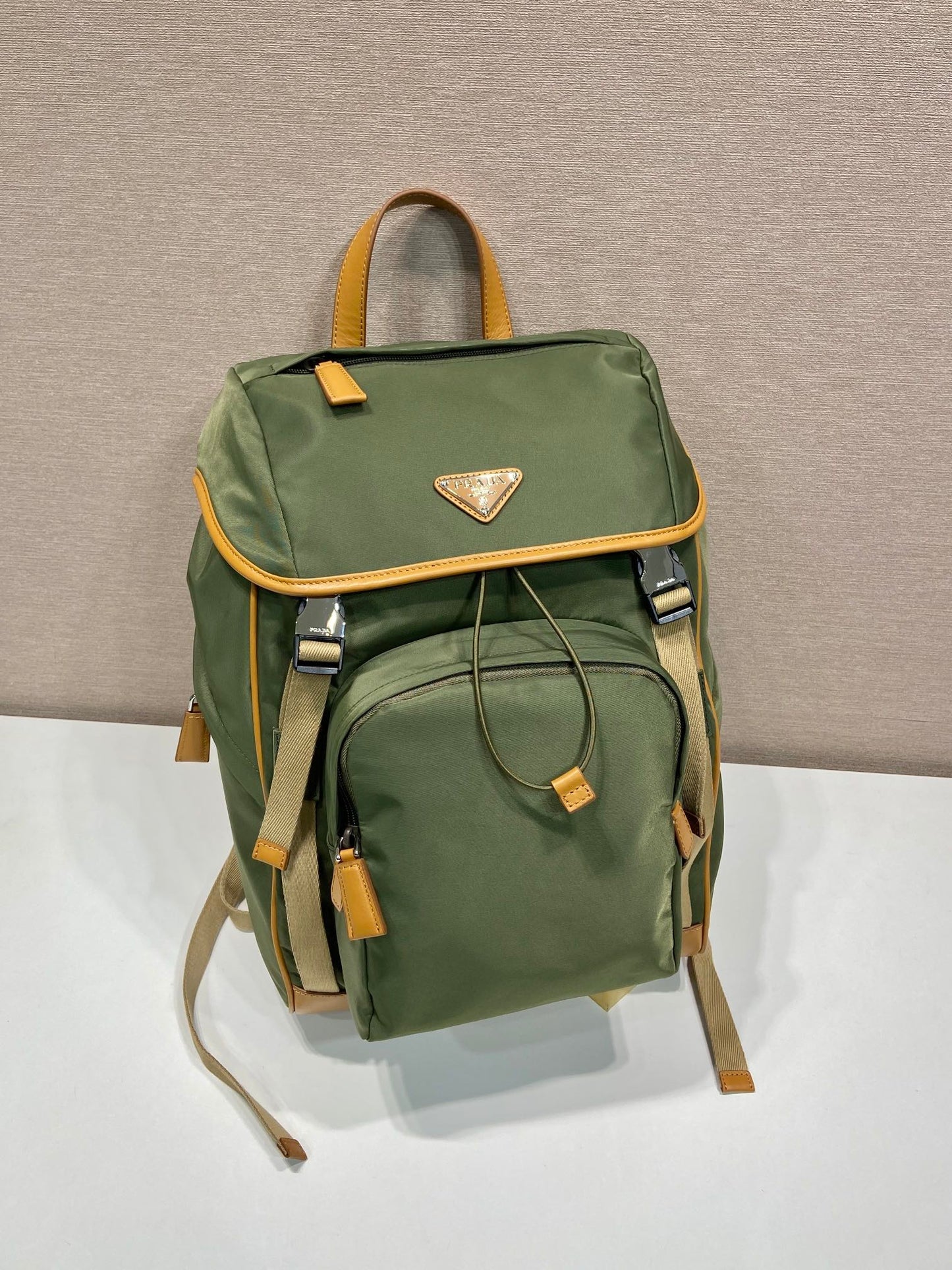 PRADA BACKPACK 45 IN SEAWEED GREEN RE-NYLON AND BROWN CALFSKIN TRIM