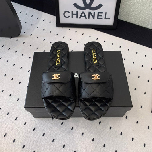 CHANEL SLIPPERS IN BLACK CALFSKIN