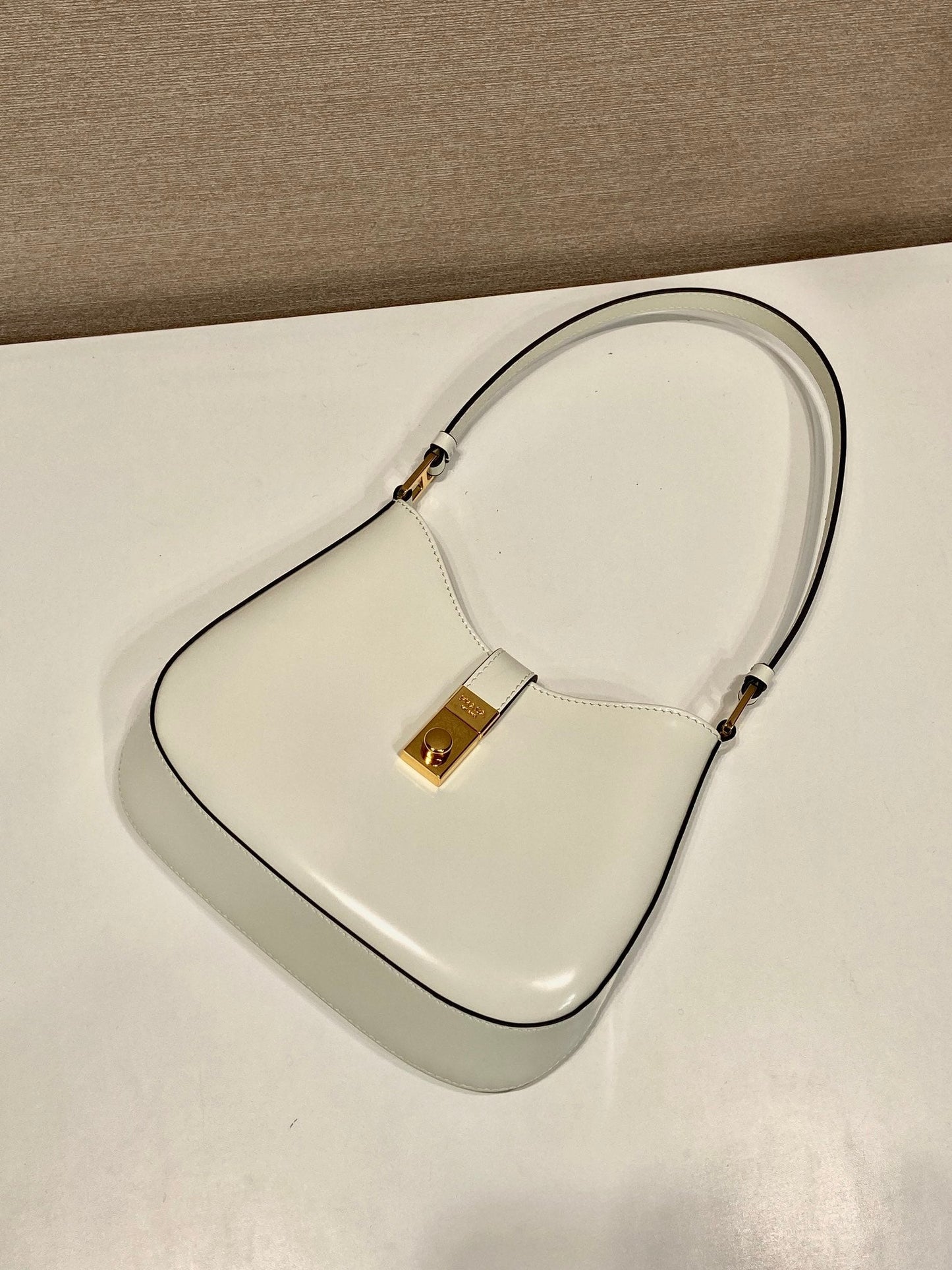 PRADA CLEO SHOULDER BAG 22 IN WHITE BRUSHED LAMBSKIN WITH CLASP CLOSURE