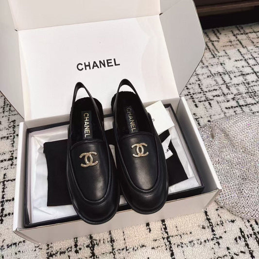 CHANEL SLINGBACK LOAFER IN BLACK CALFSKIN AND SHEARLING