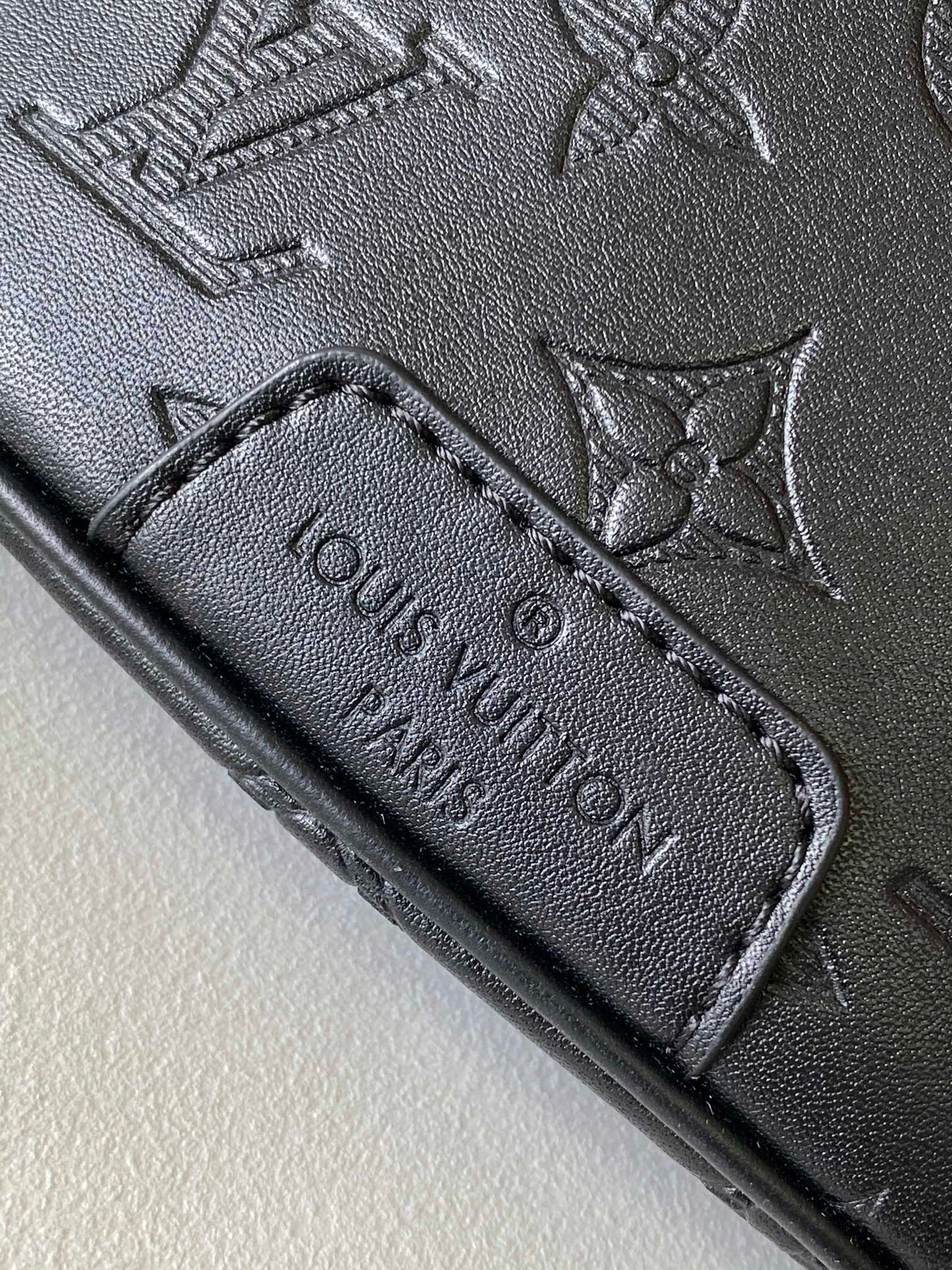 LOUIS VUITTON LV BELT BAG 44 IN BLACK EMBOSSED MONOGRAM CALFSKIN