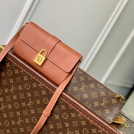 LOUIS VUITTON LOW KEY BAG 22 IN COGNAC BROWN CALFSKIN