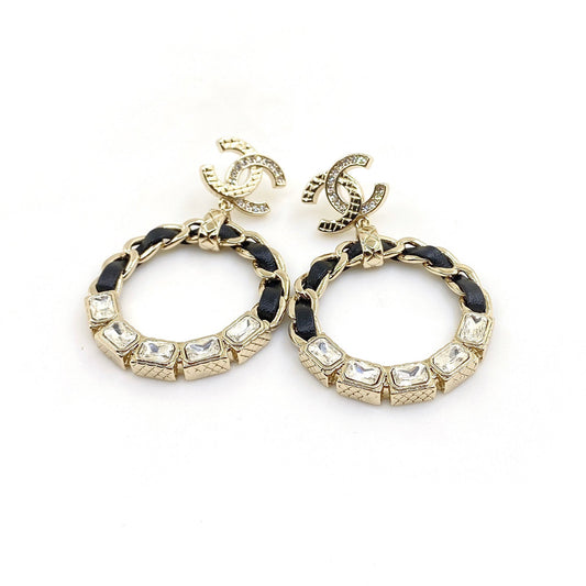 18K  Chanel Leather Cricle Earrings