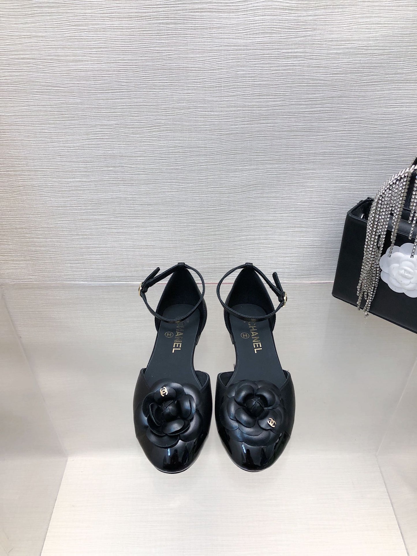 CHANEL BLACK LAMBSKIN CAMELLIA HOLLOW SANDAL