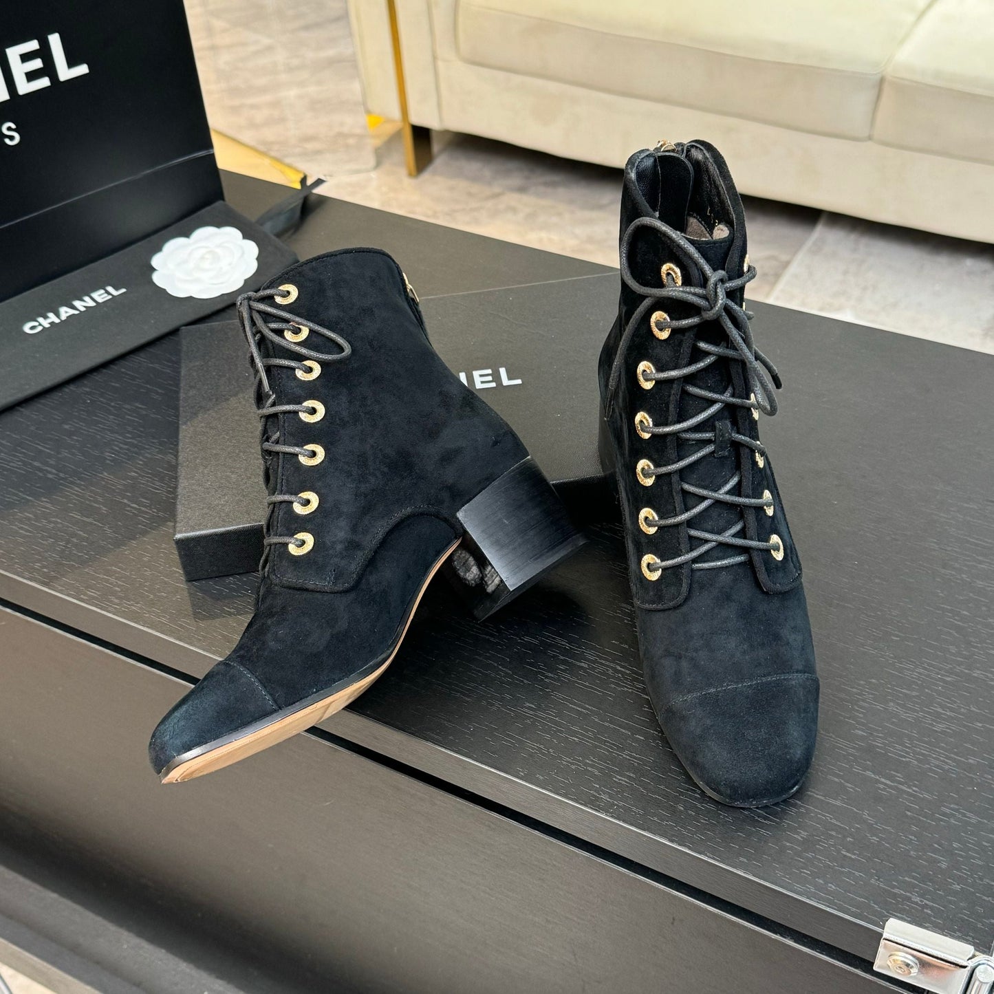 CHANEL LACE-UP SHORT BOOTS IN BLACK SUEDE
