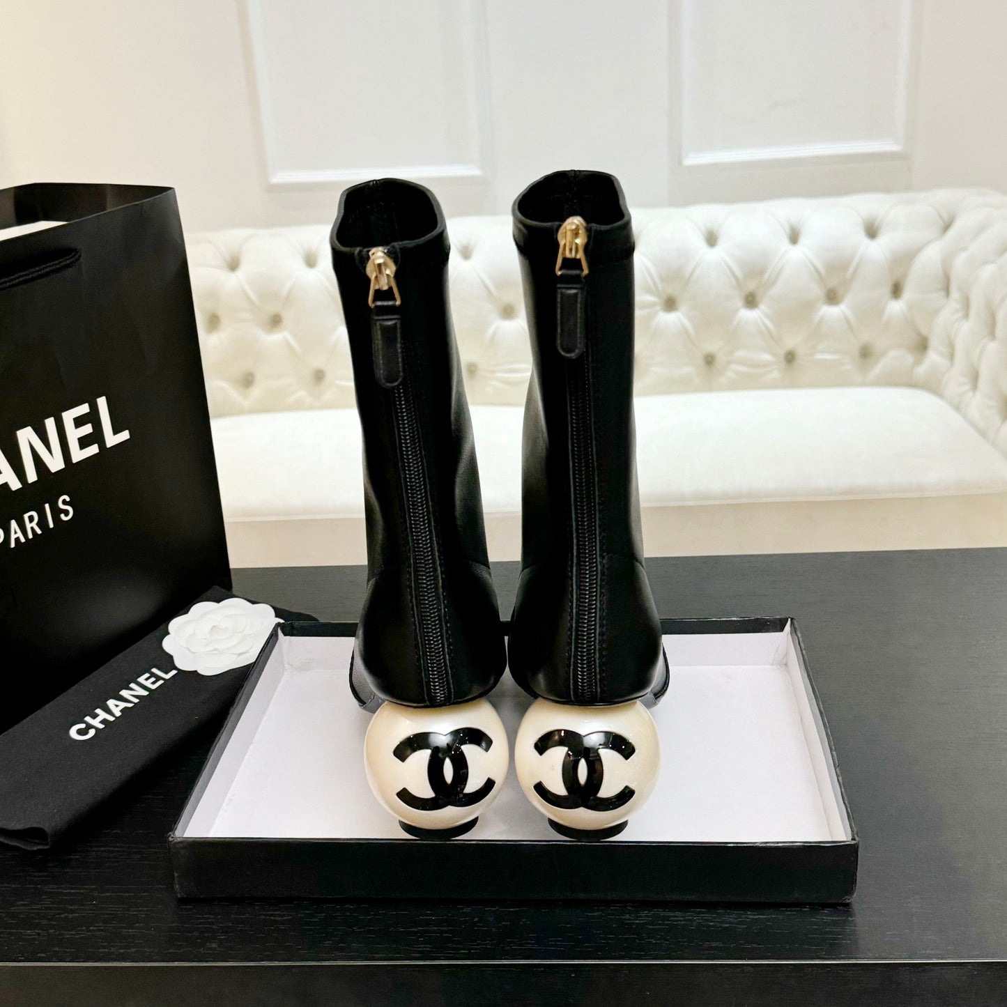 CHANEL PEARL BOOTS 65MM IN BLACK CALFSKIN
