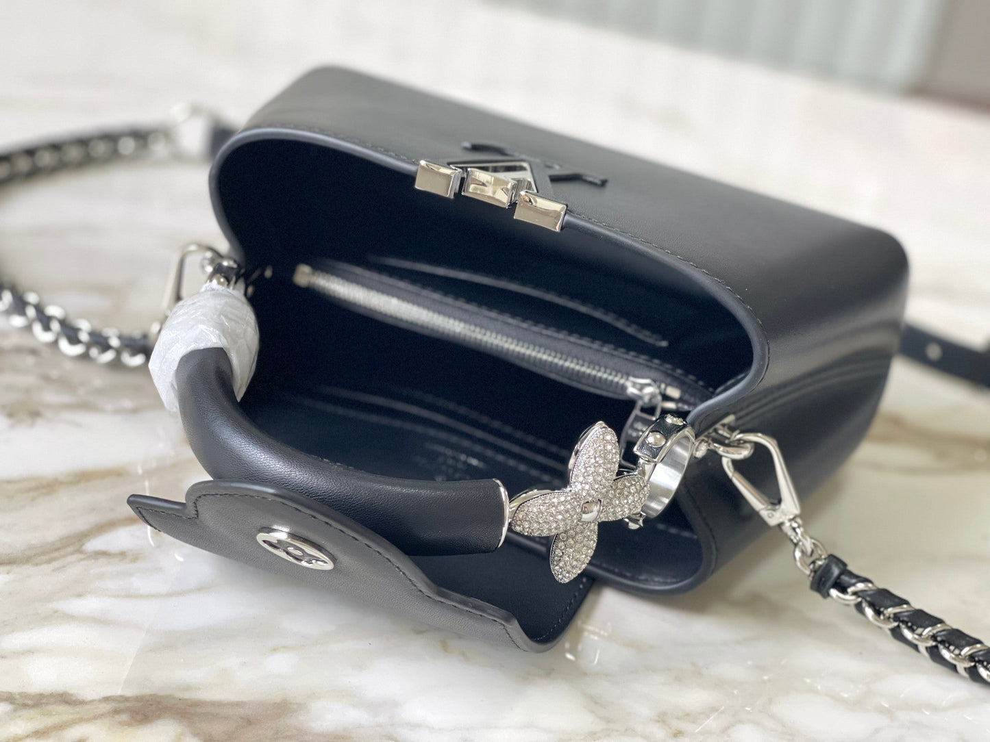 LOUIS VUITTON CAPUCINES EAST-WEST MINI 22 IN BLACK SHEEPSKIN CRYSTAL AND SILVER HARDWARE