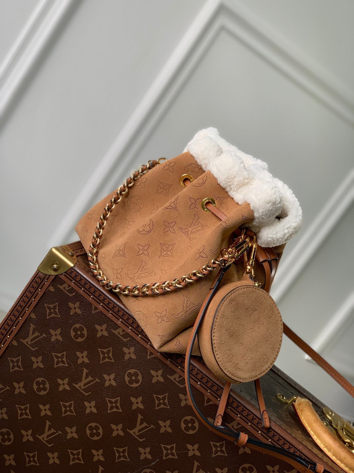 LOUIS VUITTON BELLA 22 IN CINNAMON BROWN MONOGRAM PERFORATED SUEDE AND WHITE SHEARLING TRIM