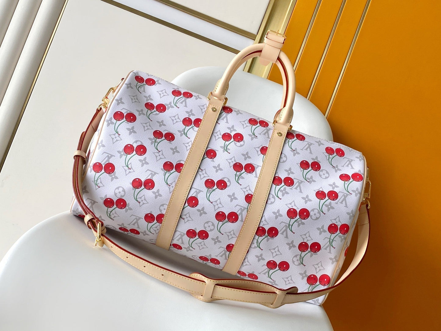 LOUIS VUITTON KEEPALL BANDOULIÈRE 45 IN WHITE AND RED CALFSKIN