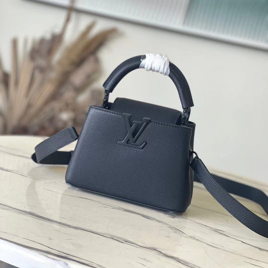 LOUIS VUITTON CAPUCINES EAST-WEST MINI 21 IN BLACK TAURILLON