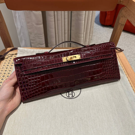 HERMES KELLY CUT 31 IN SANGRIA PURPLE ALLIGATOR LEATHER WITH GOLD HARDWARE