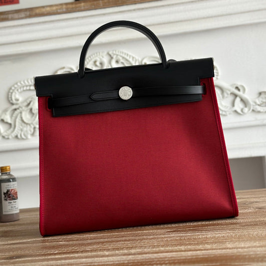 HERMES ZIP CABINE 31 BAG IN RUBY RED CANVAS AND BLACK CALFSKIN