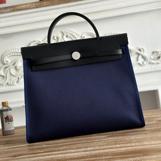 HERMES ZIP CABINE 31 BAG IN NAVY BLUE CANVAS AND BLACK CALFSKIN
