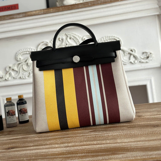 HERMES HERBAG ZIP 31 LAQUERED BAG IN BROWN MIX YELLOW H PLUME CANVAS