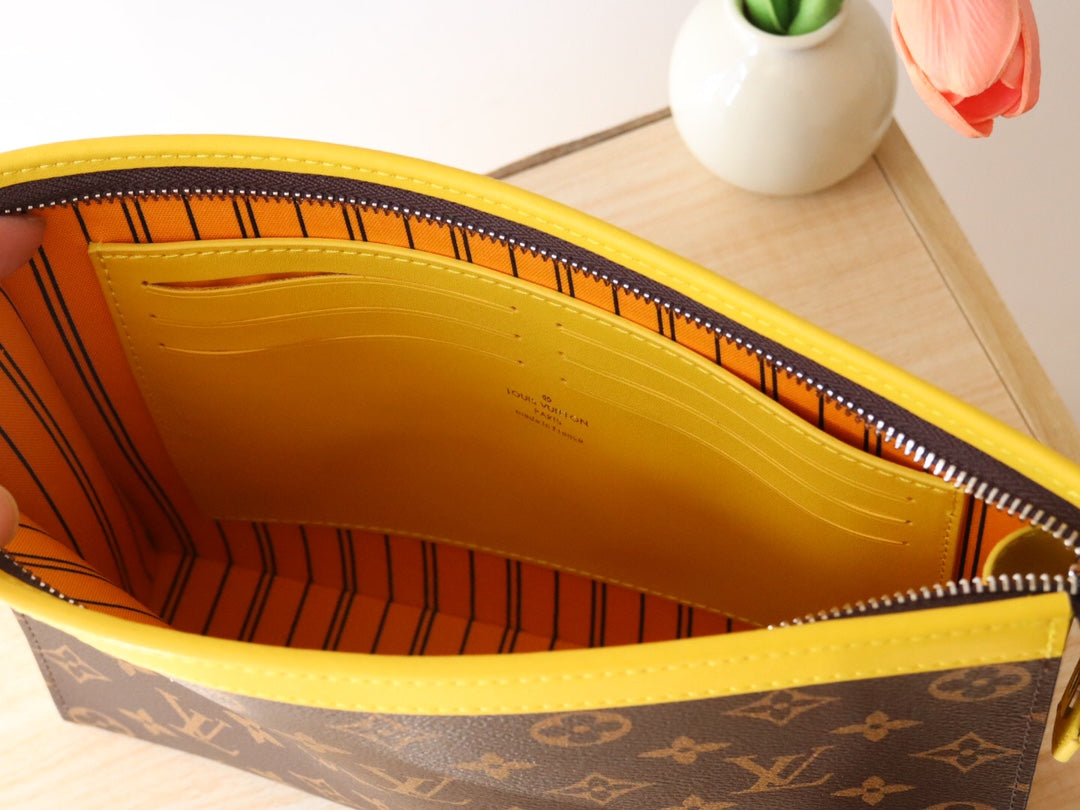 LOUIS VUITTON LV 25S POCHETTE VOYAGE 26 IN YELLOW MONOGRAM MACASSAR COATED CANVAS