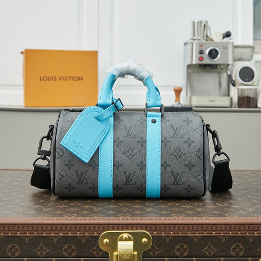 LOUIS VUITTON KEEPALL BANDOULIÈRE 25 IN GUN METAL MONOGRAM ECLIPSE CANVAS MIX TURQUOISE CALFSKIN