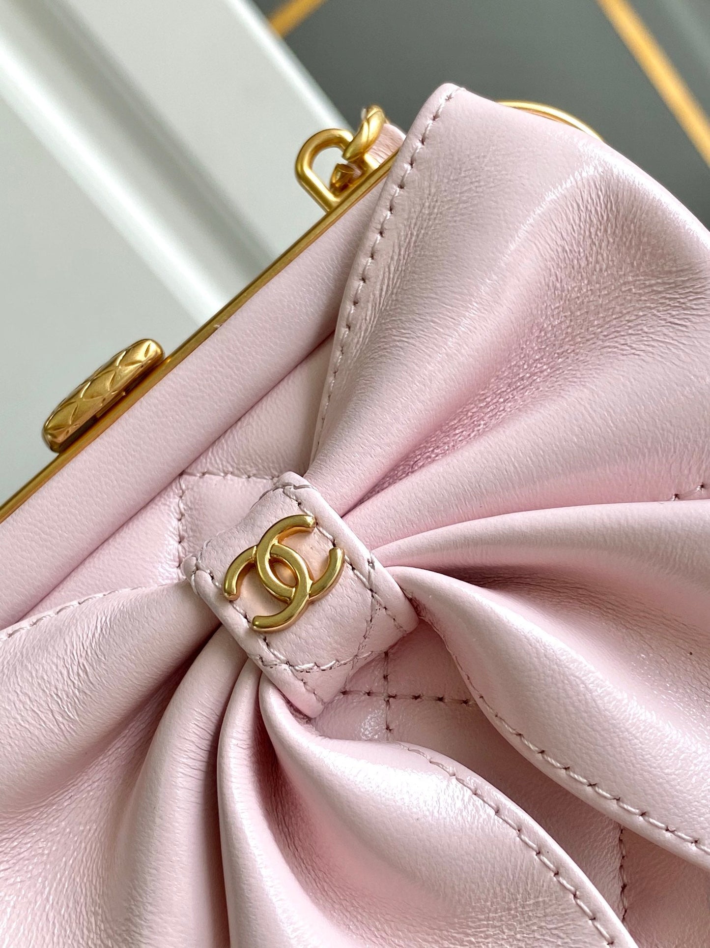 CHANEL MINI 13 CLUTCH WITH STRAP IN LIGHT PINK LAMBSKIN ATTACH BOW
