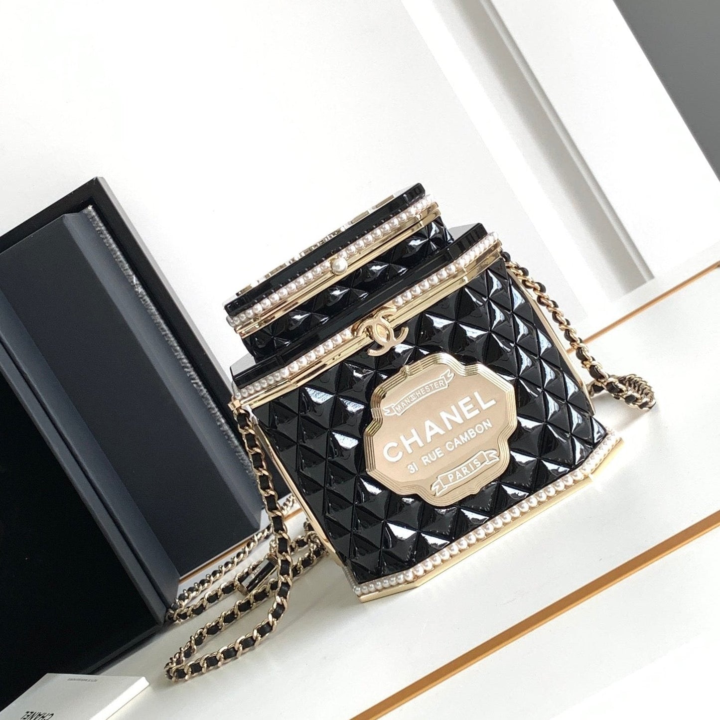 CHANEL 12 TEA BOX MINAUDIERE BAG IN BLACK RESIN