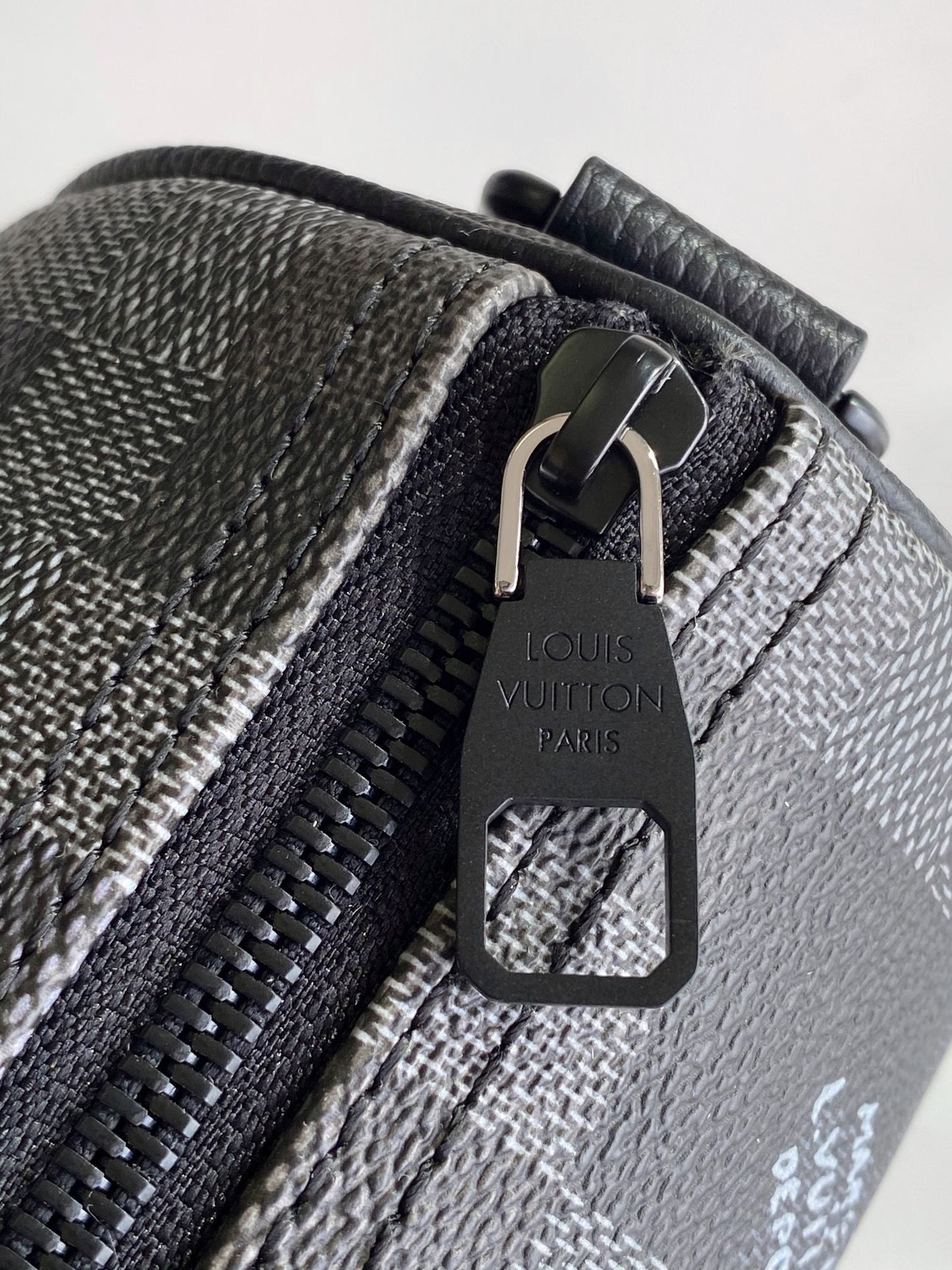 LOUIS VUITTON LV 25S KEEPALL BANDOULIÈRE 25 BAG IN DAMOFLAGE BLACK CALFSKIN
