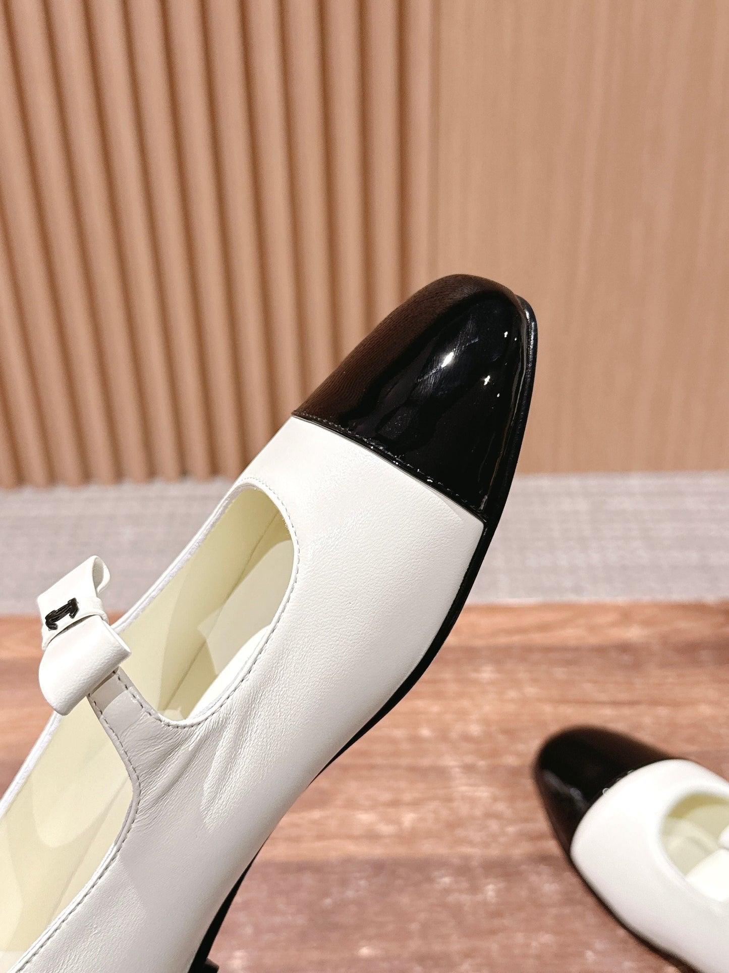 CHANEL 25S BALLET MARY JANES BLACK AND IVORY IN CALFSKIN