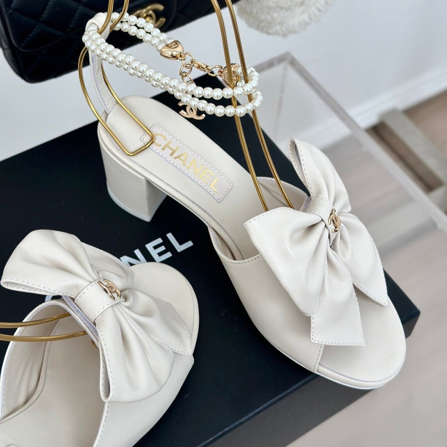 CHANEL Double C Big Bow Pearl Chain High Sandals White Lambskin