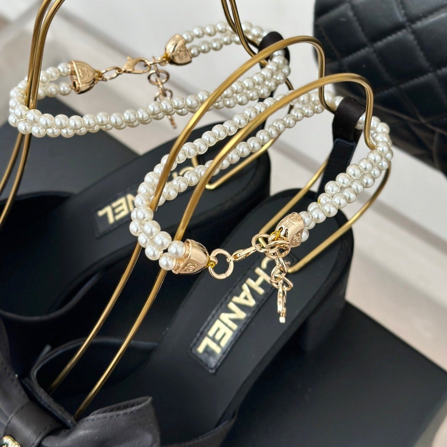 CHANEL Double C Big Bow Pearl Chain High Sandals Black Lambskin