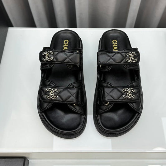 CHANEL dad sandals black lambskin mules