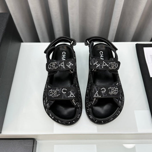 CHANEL dad sandals black denim mules