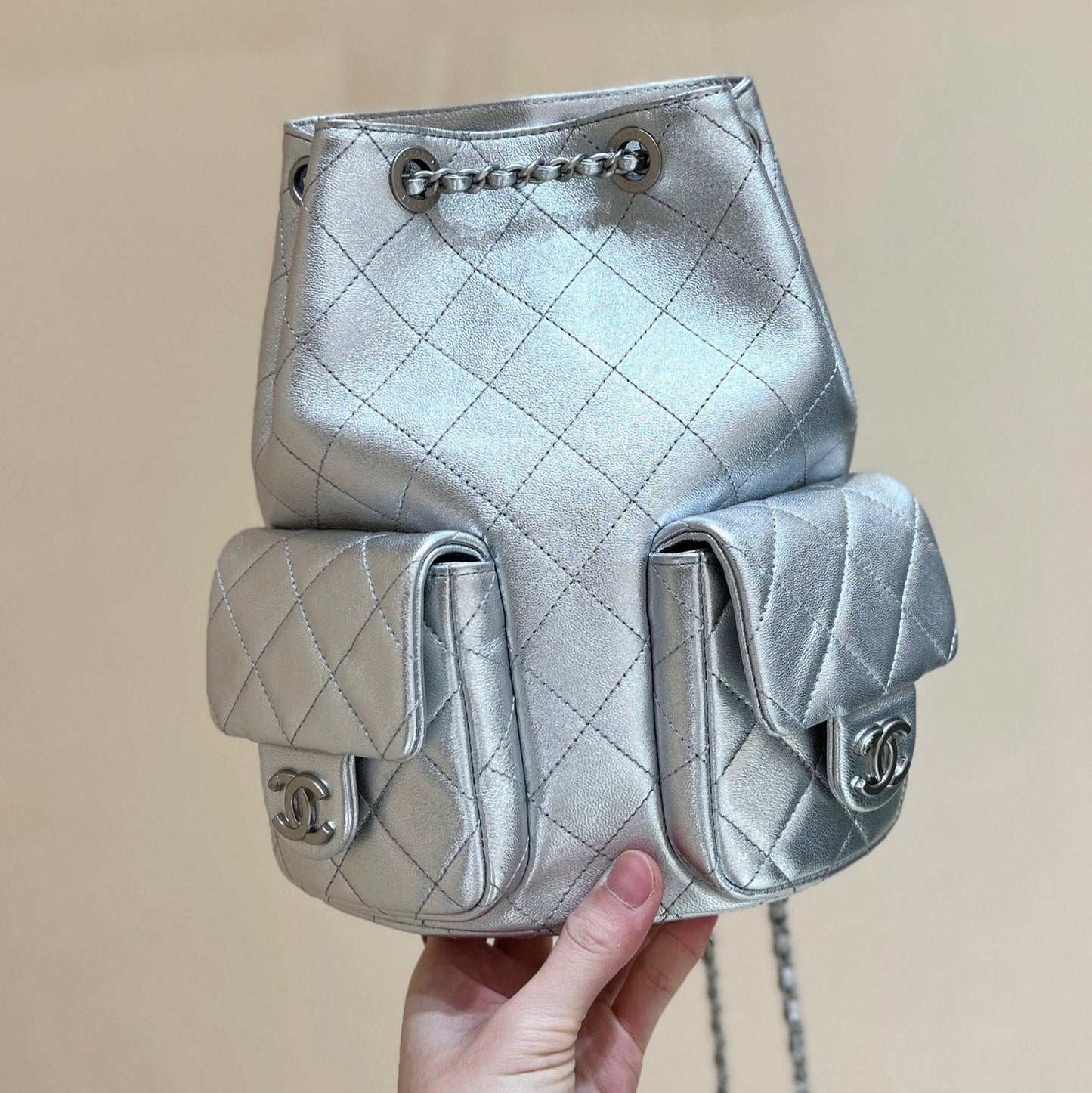 CHANEL DRAWSTRING BUCKET BACKPACK 24 IN SILVER-TONE LAMBSKIN SILVER HARDWARE